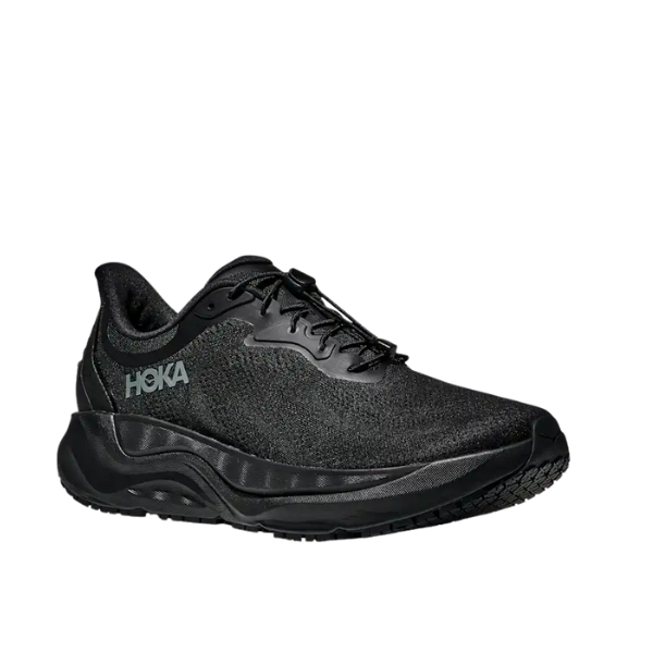 The Hoka Men's Arahi SR Black/Black Wide is a stable, cushioned black shoe with black laces and HOKA logo on the side.
