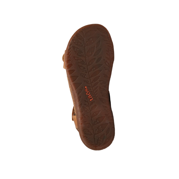 The Taos Women's Wonderful Caramel sandal has a supportive sole with a leaf-patterned tread and orange Taos branding.