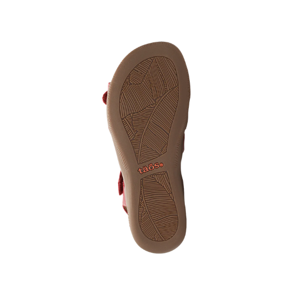 The sole of the TAOS Women's Big Time Red sandal features a textured tread and an orange SOFT SUPPORT footbed.
