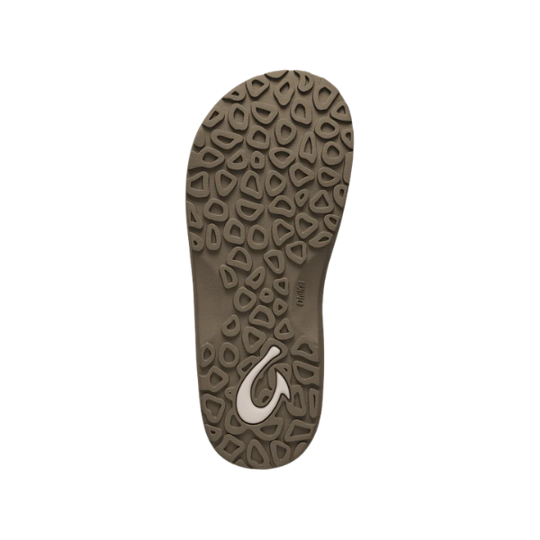 Beige sole with irregular tread and curved logo, as on OLUKAI Women's Ohana Tapa sandals.