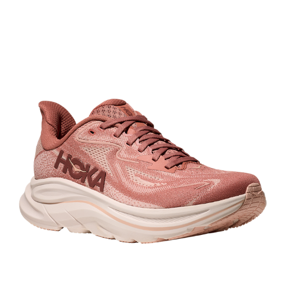 The HOKA Women's Clifton 10 in Blush/Rose Lat features a cushioned pink upper and thick white sole, shown angled on white.