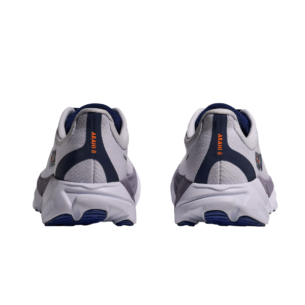 A pair of gray HOKA W Arahi 8 Starlight Glow/Blue shoes viewed from the back, featuring blue soles.