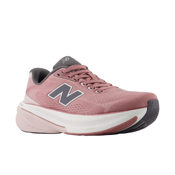 A New Balance Women's 860V15 Wide running shoe in rose/white with gray accents, shown from the side.