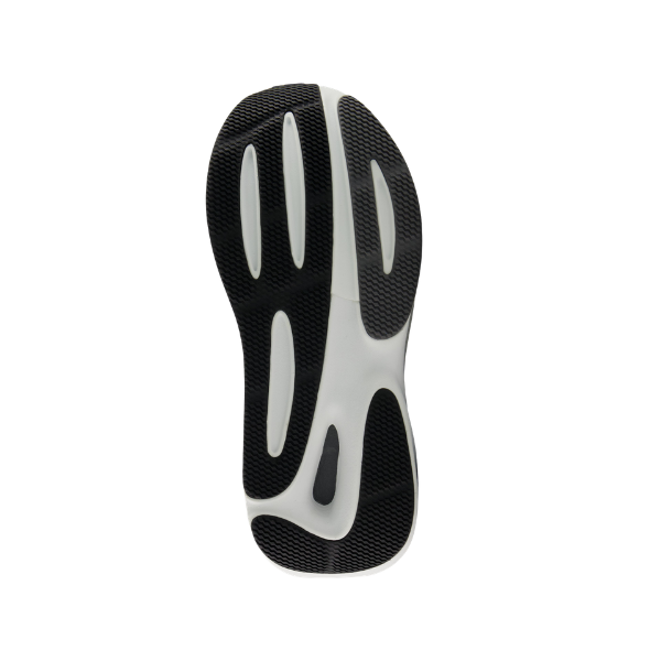 Bottom view of the NEW BALANCE Women's 860V15 Black/White sole with textured grip on a white background.