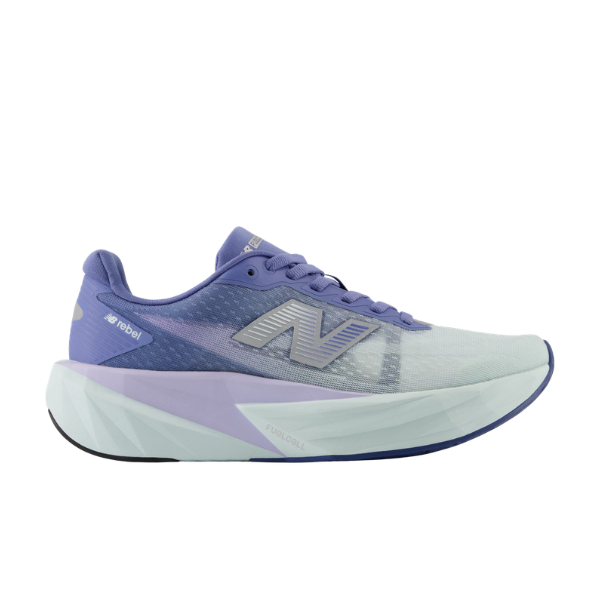 NEW BALANCE Wfcx5tv | W Rebel V5 Blue women’s sneakers with a thick sole, side view on white background.