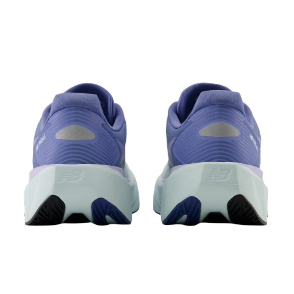 Rear view of NEW BALANCE Wfcx5tv | W Rebel V5 Blue women’s sneakers with chunky, textured soles.