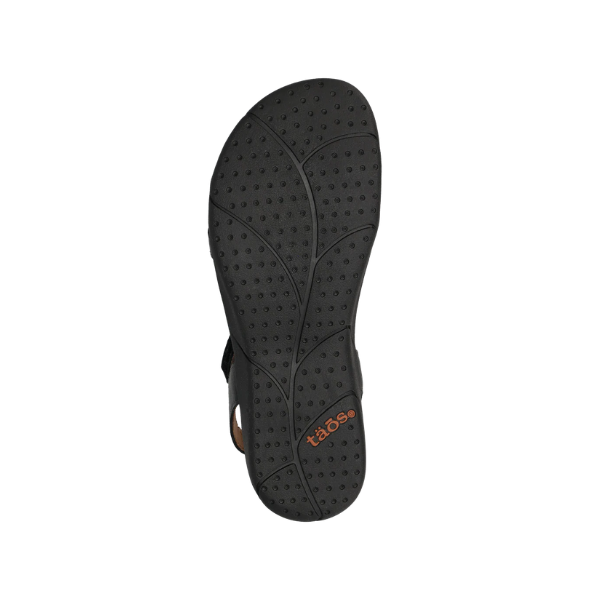 The TAOS Women's Trophy 2 Black Emboss sandal features a textured sole, arch support, and an orange logo by the heel.
