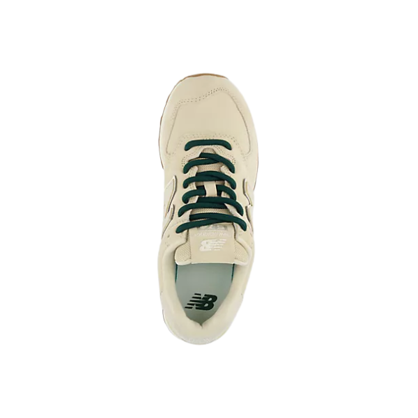 Top view of New Balance Women's 574 Tan sneaker with dark green laces and logo, ideal for versatile women’s style.