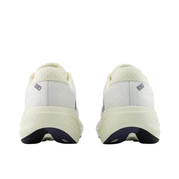 Back view of New Balance Women's 880 V15 Yellow/Grey with Fresh Foam X cushioning and light-colored soles.