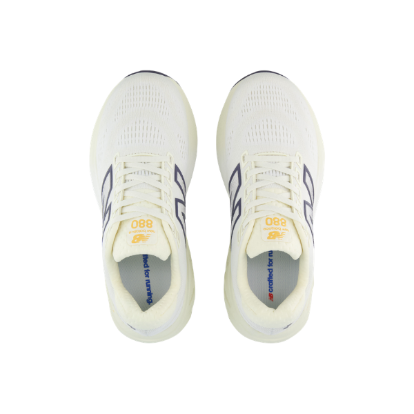 Top view of New Balance Women's 880 V15 in yellow/grey—cushioned sneakers by NEW BALANCE.