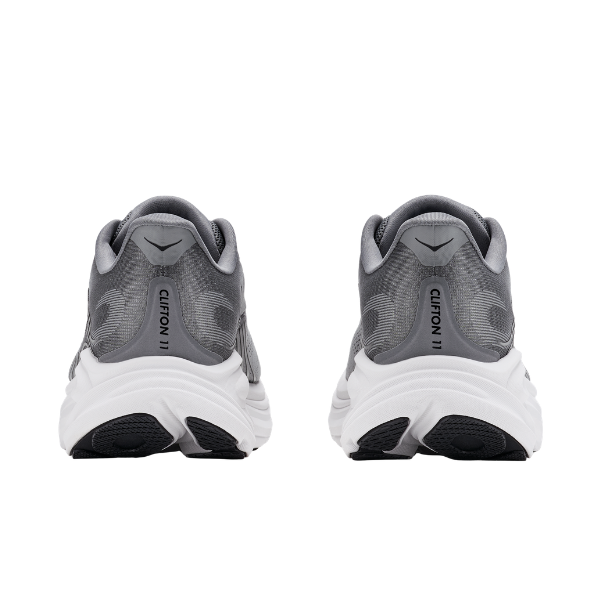 Back view of HOKA Men's Clifton 11 Grey trainers with white soles, side by side on a white background.