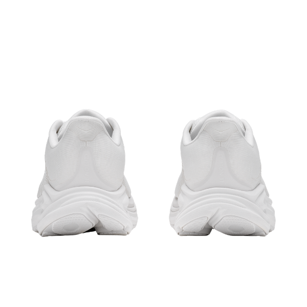 Back view of HOKA Women's Clifton 11 White/White cushioned running shoes on a plain white background.