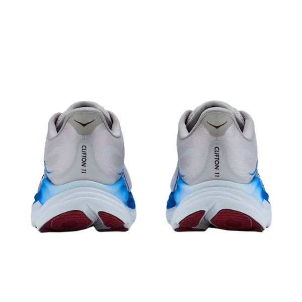 HOKA Men's Clifton 11 running shoes in Stucco/Grout, shown from the back with blue midsoles and red outsoles.