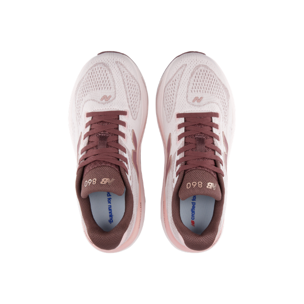 Top view of New Balance Women's 860V15 Pink running shoes with Fresh Foam X cushioning in white and pink.