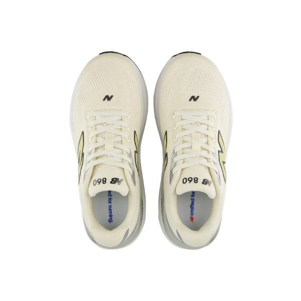 Top view of New Balance Women's 860V15 Yellow/White running shoes with black and yellow accents on a white background.