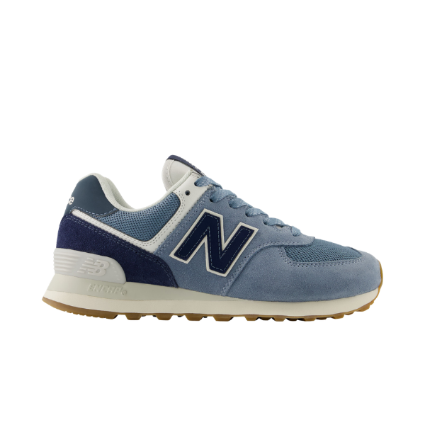 NEW BALANCE Women's 574 sneakers in blue/white with a white sole and tan outsole, shown from the side.