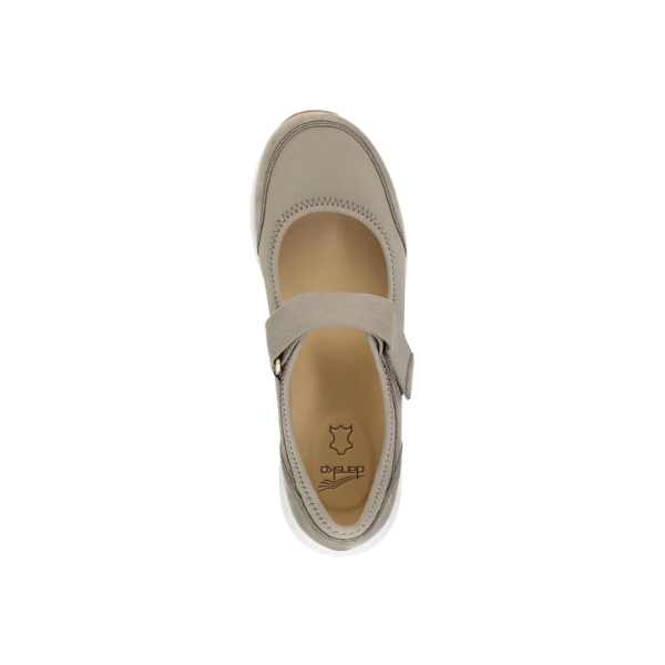 Dansko Women’s Carolina Walnut Suede Mary Jane sneaker with Velcro strap, top view on white background.