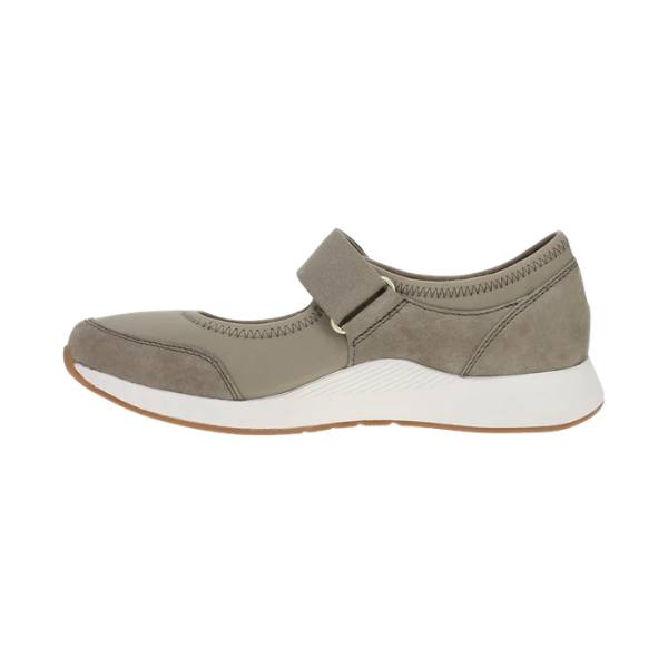 Dansko Women’s Carolina Walnut Suede Mary Jane with velcro strap, white sole, and rounded toe, shown side view.