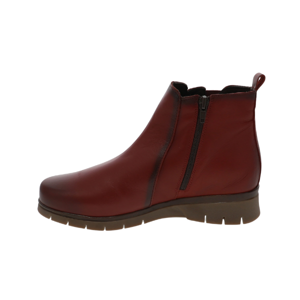 Side view of SOVELLA Gabriella Women’s Red Boot with zipper, comfy brown sole—ideal for stylish comfort lovers. Lucky Feet Shoes