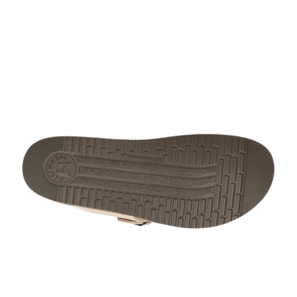 The photo displays the brown sole of the Mephisto Womens Helen Sand sandal by MEPHISTO, featuring textured grooves, embossed branding and care details, a patterned tread for grip, and a design focused on arch support and foot pain relief.