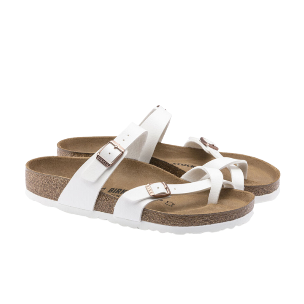 The BIRKENSTOCK Womens Mayari Birko-Flor White Leather sandals feature anatomically shaped footbeds, cork soles, adjustable metal buckles, toe loops, thick straps, and white footbeds for iconic comfort and style.