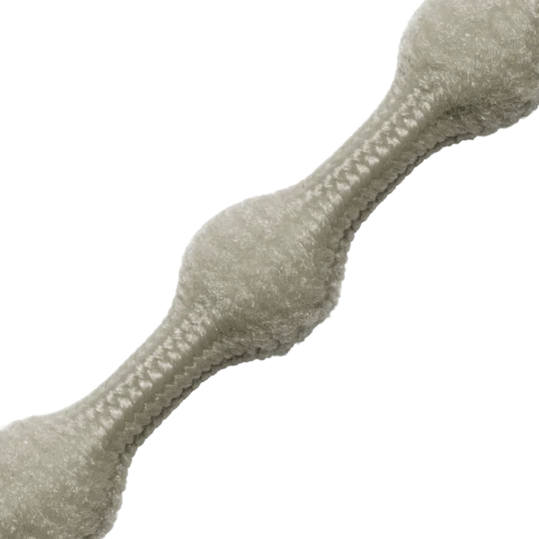 Close-up of a gray, plush, bone-shaped dog toy with visible edge stitching on a white background—ideal for pups who love carrying toys as much as you enjoy your CATERPY RUN NO-TIE LACES GREY from CATERPY.