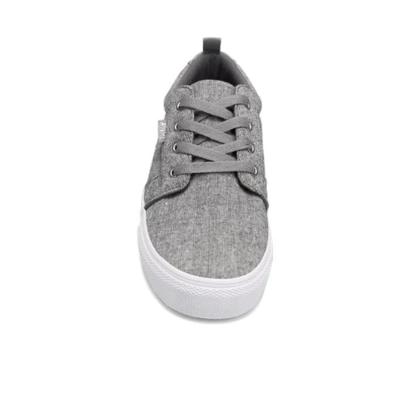 The RIVAL, INC. Rival Womens Tilt Grey Chambray is a front-view gray canvas sneaker with gray laces, a black heel pull tab, and a white abrasion-resistant rubber outsole, shown against a white background.