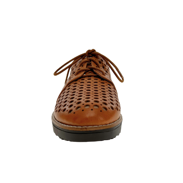 Front view of the DJANGO & JULIETT Django & Juliette Womens Onstage Tan Leather shoe featuring brown perforated leather, a black sole, and visible edge stitching—ideal for stylish and versatile athleisure wear.