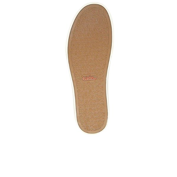 The sole of the Taos Womens Plim Soul Lux Black sneaker, shown from the bottom, features a repeating TAOS logo pattern, metatarsal support, and a small red TAOS label at the center.