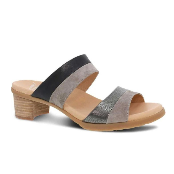 The Dansko Womens Theresa Black by DANSKO is a stylish slingback sandal with a low block heel, tan sole, and two Wide multicolored straps—designed for comfort and to help reduce foot pain.