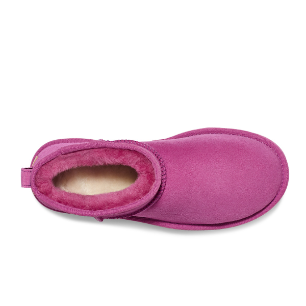 Top view of a single UGG Womens Classic Ultra Mini Boot in purple, featuring a rounded toe and plush fleece lining for warmth and comfort. This sheepskin boot combines cozy style with signature UGG quality.