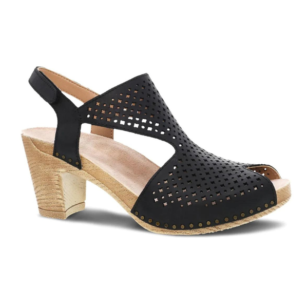 The Dansko Womens Teagan Black by DANSKO is a stylish slingback sandal with a medium tan block heel, perforated geometric cutouts, decorative studs, and an open toe—designed for all-day comfort and foot pain relief.