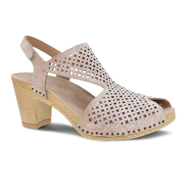 The Dansko Womens Teagan White by DANSKO is an open-toe slingback sandal with a geometric cut-out design, side closure, and light wooden block heel—crafted for style and foot pain relief.