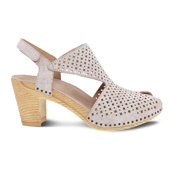 The DANSKO Womens Teagan White is a slingback sandal with cut-out geometric patterns, a Velcro strap, and a chunky wooden heel—blending style with foot pain relief.