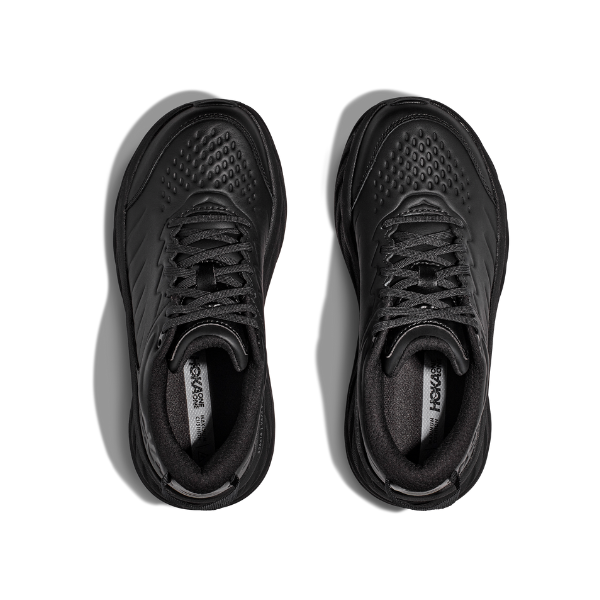 The HOKA Womens Bondi SR Wide Black sneakers by HOKA are shown from above, featuring laces, perforated toe areas, cushioned insoles with the HOKA logo, and a slip-resistant outsole, all set against a white background.