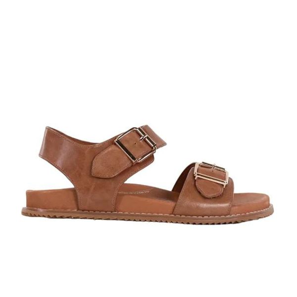 The ZIERA Womens Hastice Tan Leather sandal features two adjustable buckle straps, an open heel, leather uppers, and a treaded flat sole for comfort and style.