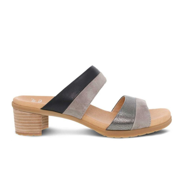 The DANSKO Womens Theresa Black is a stylish and comfortable slingback sandal with an open toe, low block heel, and two Wide straps, designed to help ease foot pain.