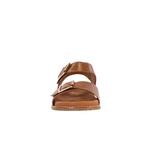Front view of ZIERA Womens Hastice Tan Leather sandals, featuring brown leather uppers with two Wide straps and large gold buckles, displayed against a plain white background.