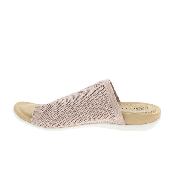 The Biza Womens Lavish Blush Metallic by BIZA FOOTWEAR is a light pink slide sandal with a mesh upper, beige footbed, and white sole, shown side profile on white. These stretch knit sandals offer foot pain relief while blending comfort and style.