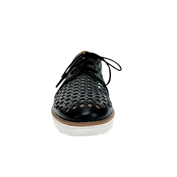 Front view of DJANGO & JULIETTE Django & Juliette Womens Onstage Black Leather shoe featuring a perforated design, tan midsole, and white sole for stylish comfort, shown on a white background.