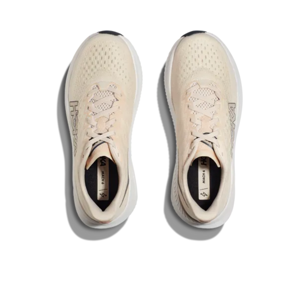 Top view of HOKA Womens Mach 6 (Wide Width) Vanilla running shoes with light beige mesh uppers, white soles, and laces. HOKA logo visible on the side—great for comfort and plantar fasciitis support. Displayed on a white background.