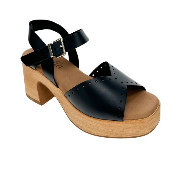 The SOVELLA Womens Lucia Black sandal features black leather, an open toe, crisscross straps, buckle closure, and a chunky light wooden heel and platform for lasting comfort.