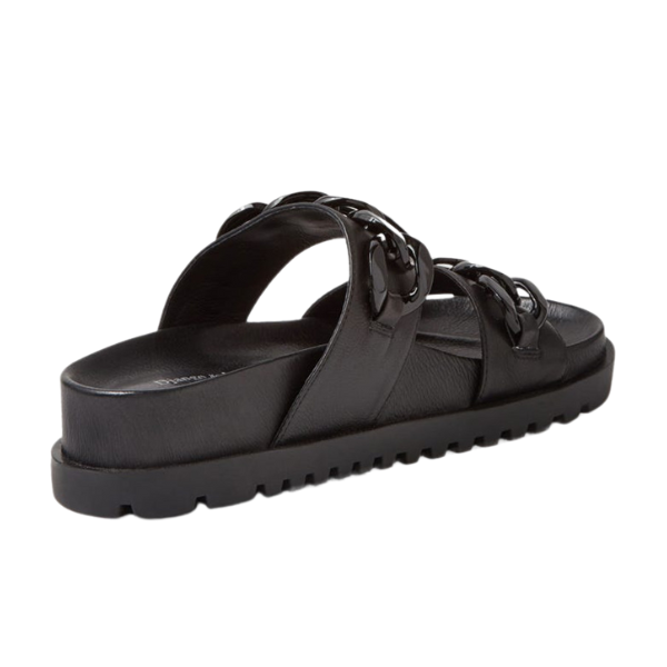 The Django & Juliette Womens Ubey Black Leather slide features two Wide straps, chain-like detailing, and a textured platform sole—effortlessly chic and comfortable.