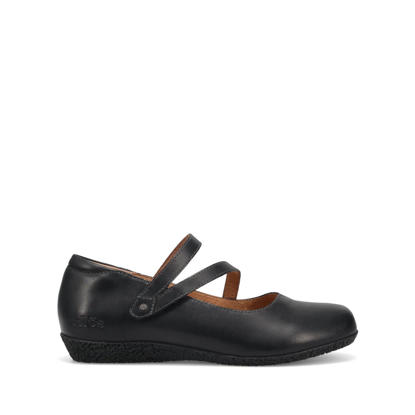 The TAOS Taos Womens Banter Black is a chic luxe leather Mary Jane flat with a low wedge heel, two crossing straps, arch and metatarsal support, plus a removable footbed for all-day comfort. Shown in profile against a white background.