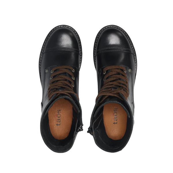 Top view of TAOS Taos Womens Crave Boot Black with brown laces, tan insoles, and taos logo. The stylish, arch support boots are side by side on a white background.