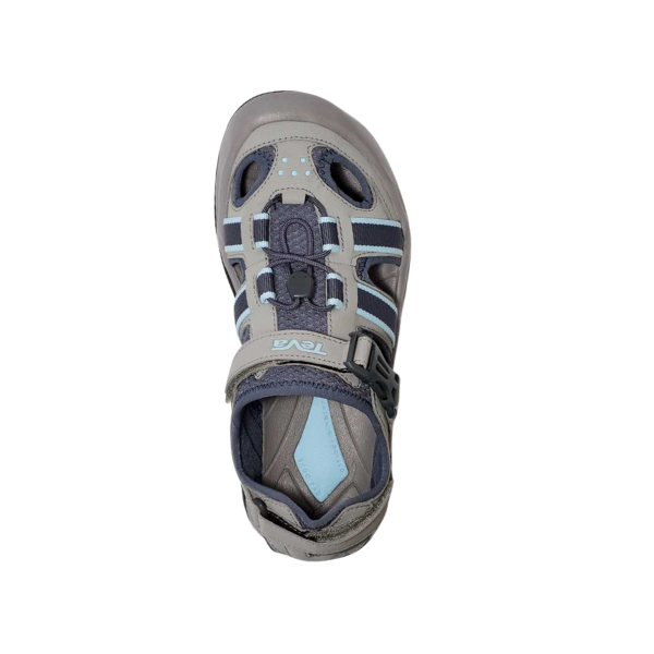 The Teva Womens Omnium 2 Slate sport sandal by Teva features a gray and blue closed toe, ventilation holes, quick-drying upper, elastic laces, and an adjustable hook-and-loop ankle strap, shown from above on a white background.