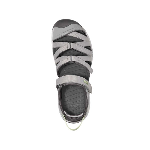 Top view of the Teva Womens Tirra CT Grey adventure sandal with crisscross straps, closed toe, heel strap, pull loop at the back, and arch support for comfort; shown against a white background.