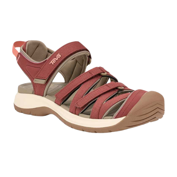 The Teva Womens Tirra CT Mahogany sandal features multiple red straps, a closed toe, cushioned insole, and durable brown rubber sole—made from recycled polyester for outdoor or casual use.