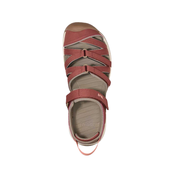 The Teva Womens Tirra CT Mahogany sandal features crisscross straps, a hook-and-loop ankle strap, and heel pull tab, made from recycled polyester. Shown in red and beige from above on a white background.