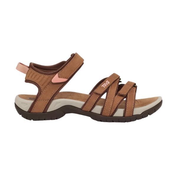 The Teva Womens Tirra Leather Brown sandal features adjustable straps, cushioned sole, arch support, and Velcro ankle closure—ideal for outdoor or casual wear.